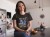 happy-hispanic-woman-sitting-down-in-the-kitchen-while-wearing-a-round-neck-tee-mockup-a15907 (Copy).jpg
