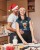 t-shirt-mockup-featuring-a-happy-woman-wearing-a-christmas-hat-with-her-partner-while-baking-m2149-r-el2-4-copy.jpg