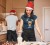 christmas-themed-mockup-of-a-woman-wearing-a-round-neck-tee-and-a-santa-hat-while-cooking-m2150-r-el2-3-copy.jpg
