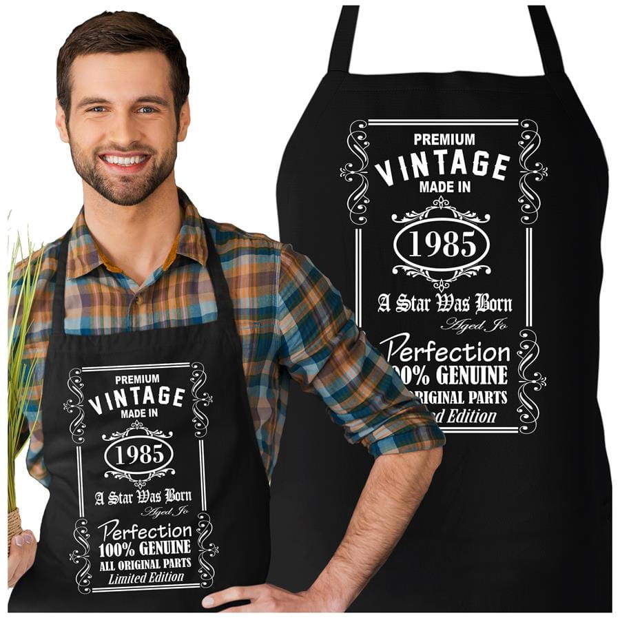 Fartuch na 40 urodziny prezent urodzinowy z napisem: "Premium vintage made in 1985 a star was born aged to perfection 100% genuine all original parts limited edition"